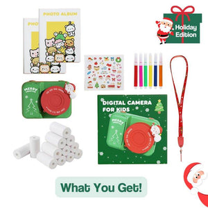 Holiday edition Kid Instant Print Camera bundle with green and red camera, colored markers, photo albums, thermal paper rolls, stickers, and red lanyard for kids' creative photography