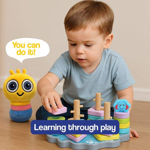 Soft white Boolby plush toy with big expressive eyes, a perfect learning buddy for kids aged 0-10+ encouraging curiosity and confidence