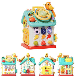 Montessori Busy House toy for toddlers with interactive buttons, switches, doors, and lights to develop fine motor skills and coordination.