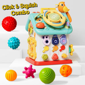 Montessori Busy House toy with interactive buttons, switches, steering wheel, bird figure, and sensory balls for fine motor skills development in toddlers.