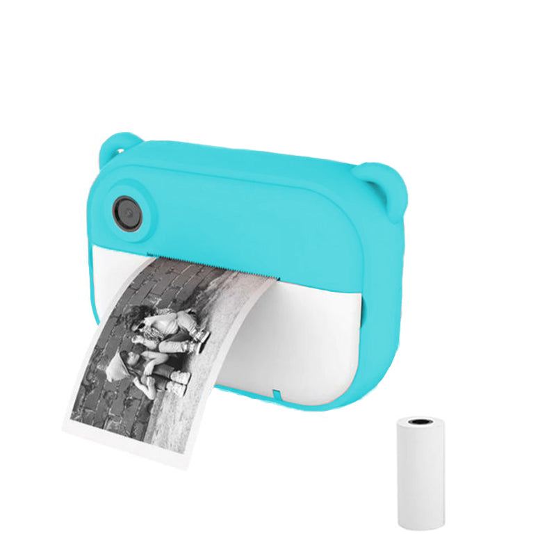 Blue kid instant print camera with black and white photo and thermal paper roll refill