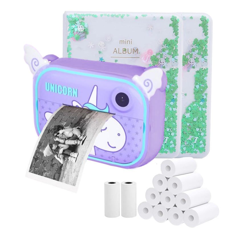Kids instant print camera in unicorn design with thermal paper rolls and photo album for creative photography fun