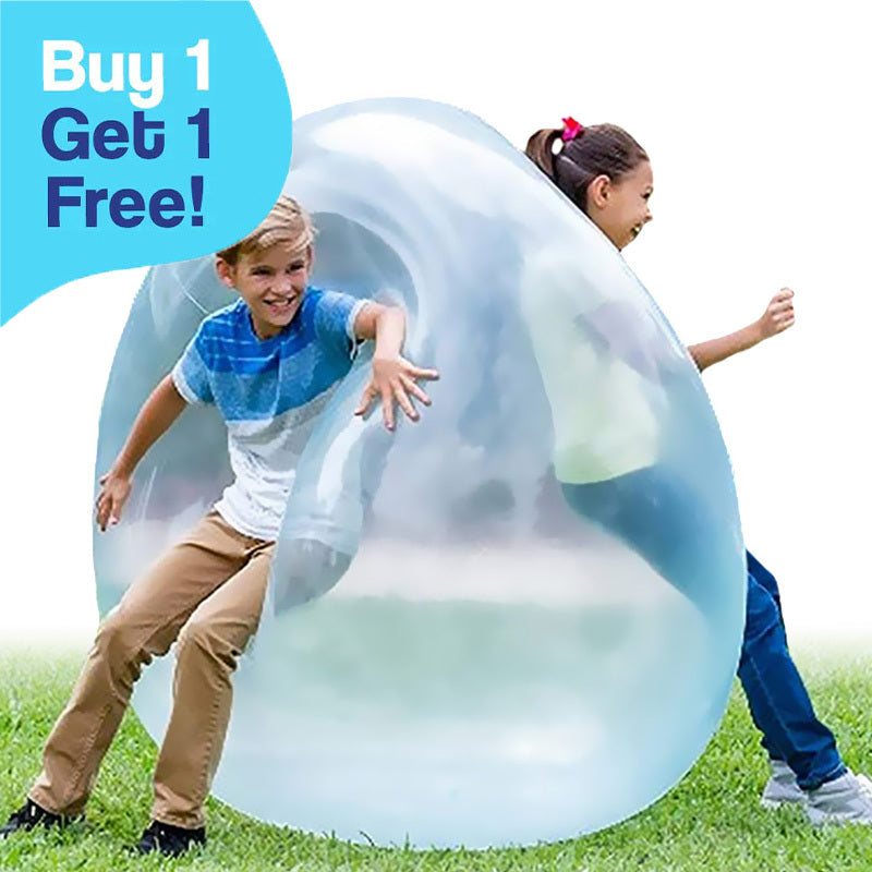 Kids playing outdoors with a transparent Giant Jelly Balloon Ball inflatable toy on grass, buy one get one free offer visible